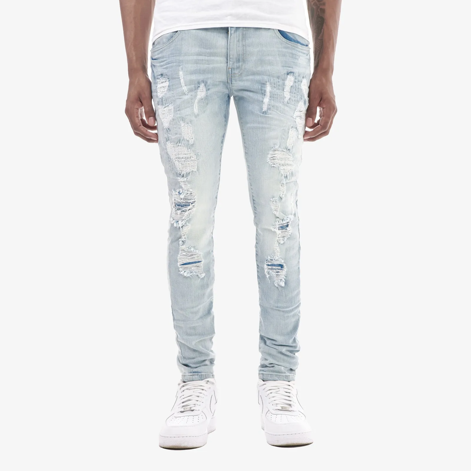 LIGHT SAND BLUE JEANS W/ RIP & REPAIR