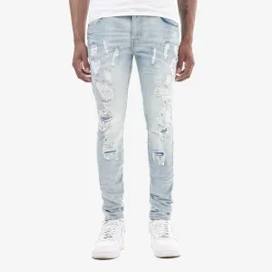 LIGHT SAND BLUE JEANS W/ RIP & REPAIR