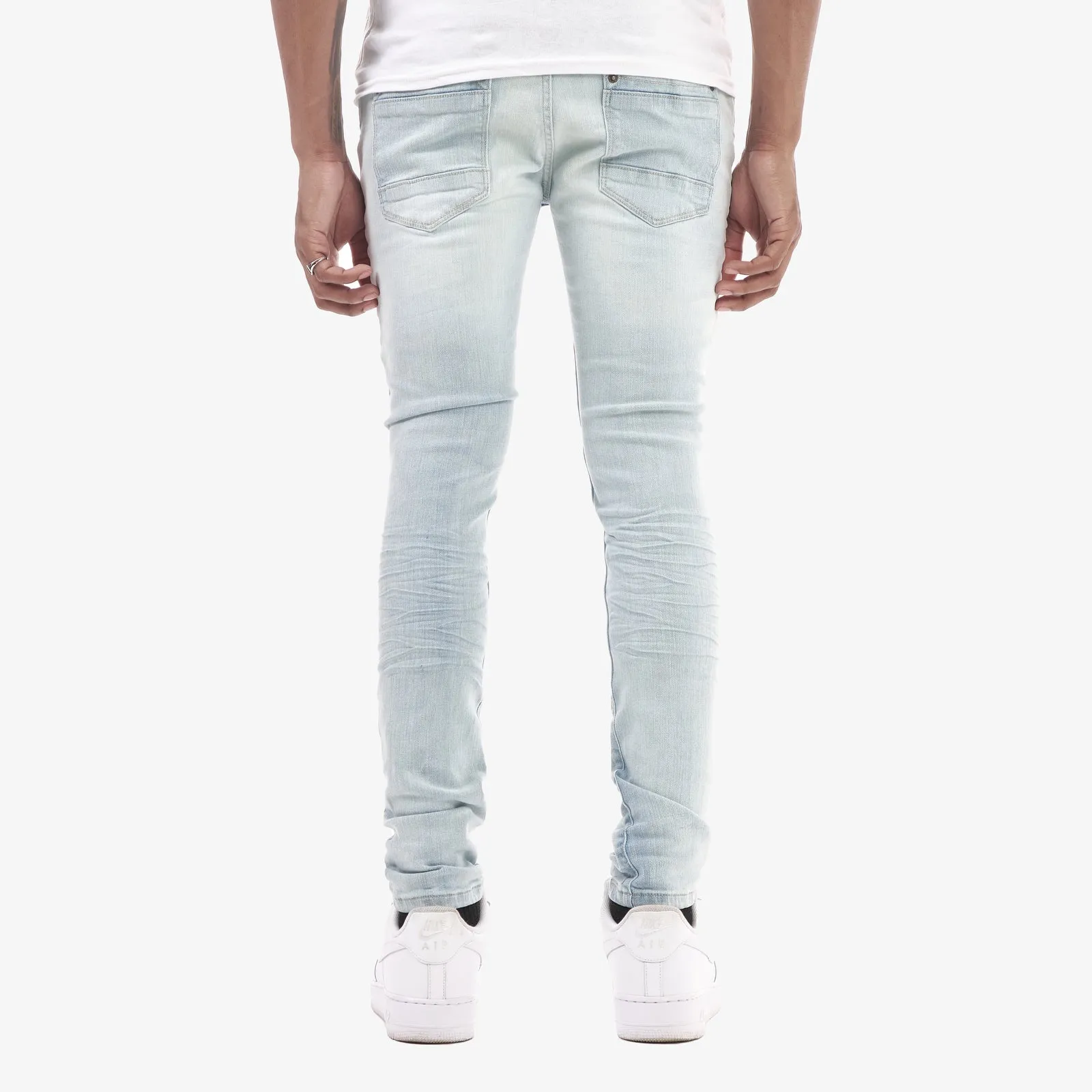 LIGHT SAND BLUE JEANS W/ RIP & REPAIR