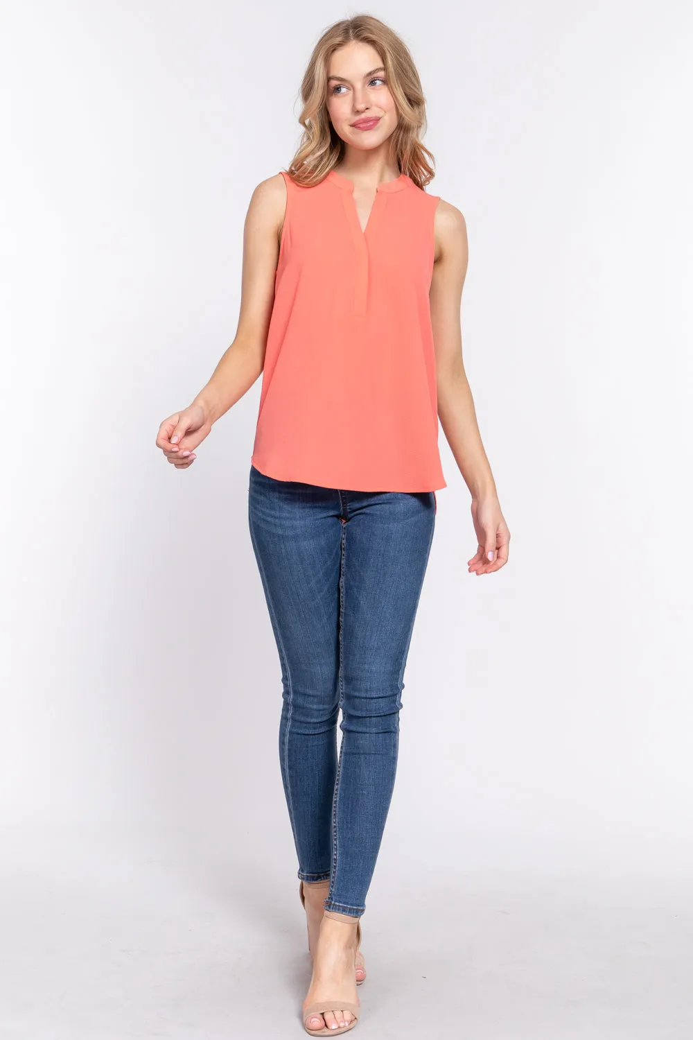 Solid Sleeveless Woven Top with Hidden Button