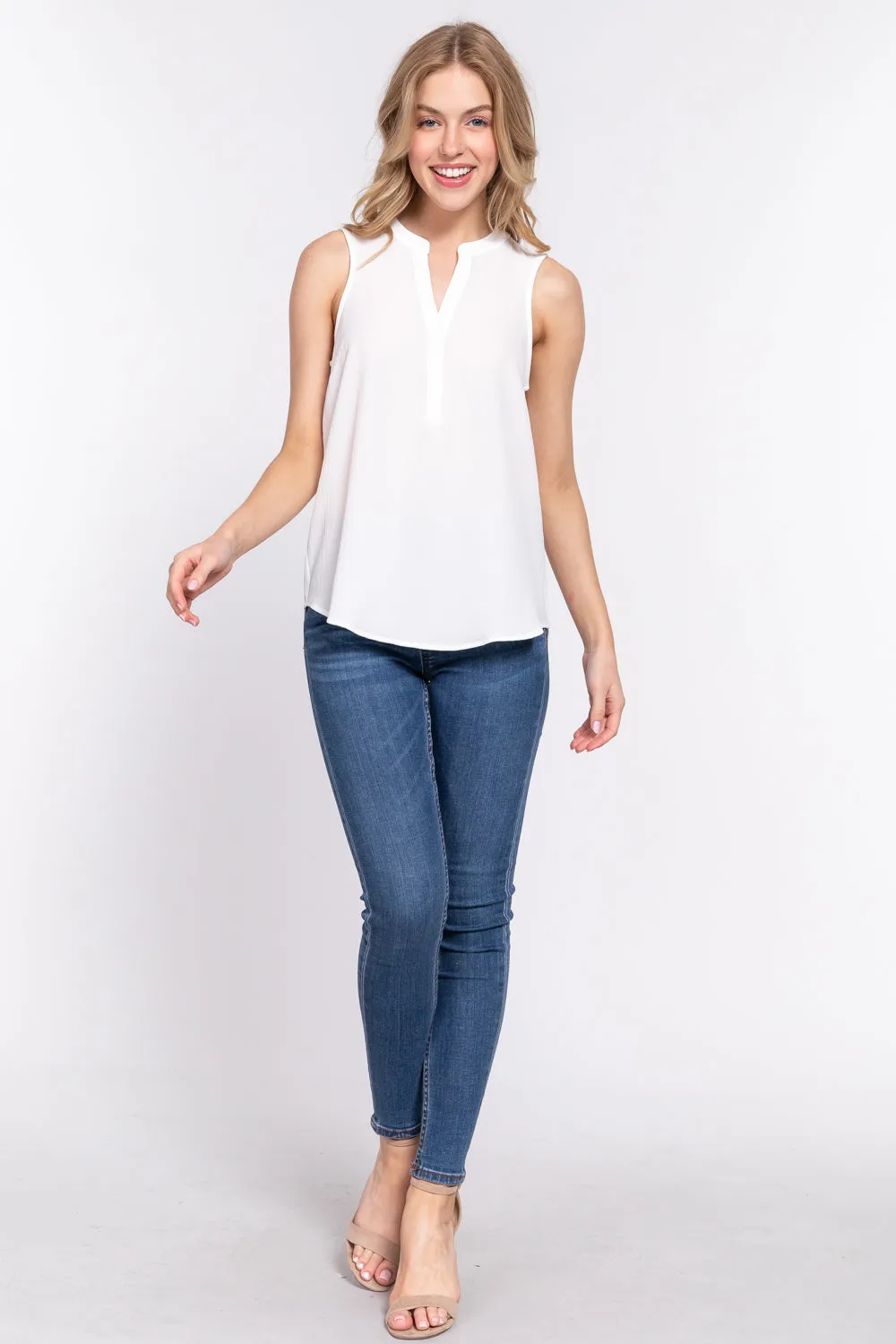 Solid Sleeveless Woven Top with Hidden Button